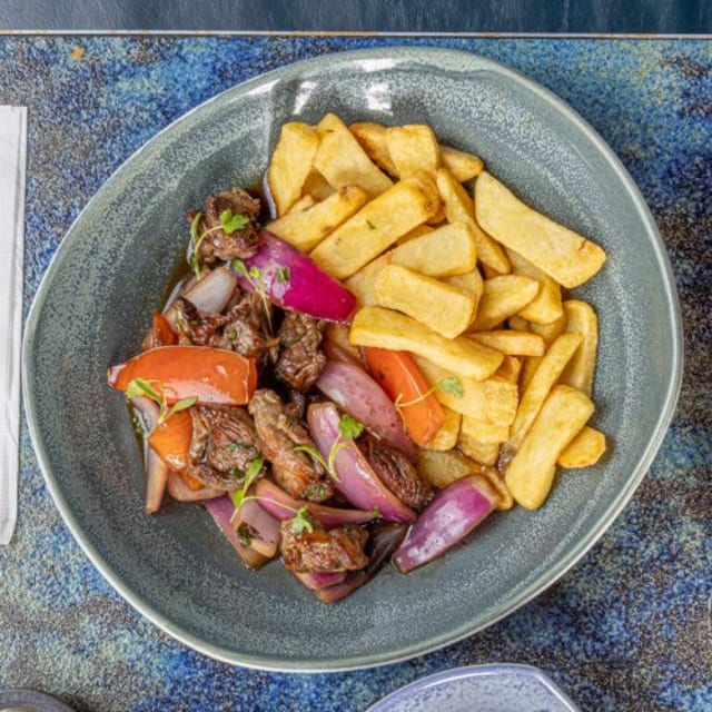 Lomo Saltado Flambeado.